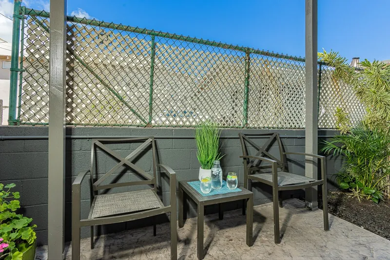 Patio with Seating for 2 to Enjoy Morning Coffee or Afternoon Margaritas Al Fresco — Authentic 3BR Duplex, Wailuku