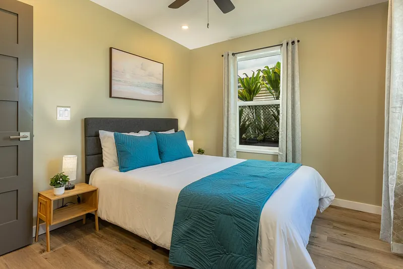 1 of 3 Bedrooms: Queen Bed, Ceiling Fan and AC — Authentic 3BR Duplex, Wailuku