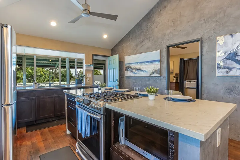 Gas Cooktop in large kitchen island — Historic 2BR Condo, Wailuku